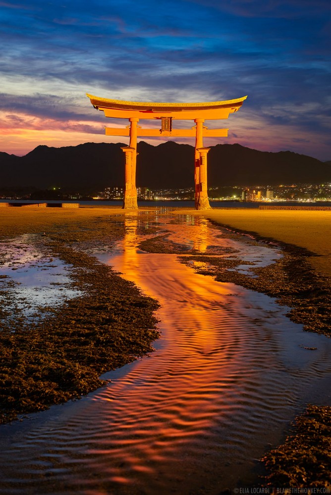 A powerful sky compliments the stunning Itsukushima Torii Gate on Miyajima Island in Japan